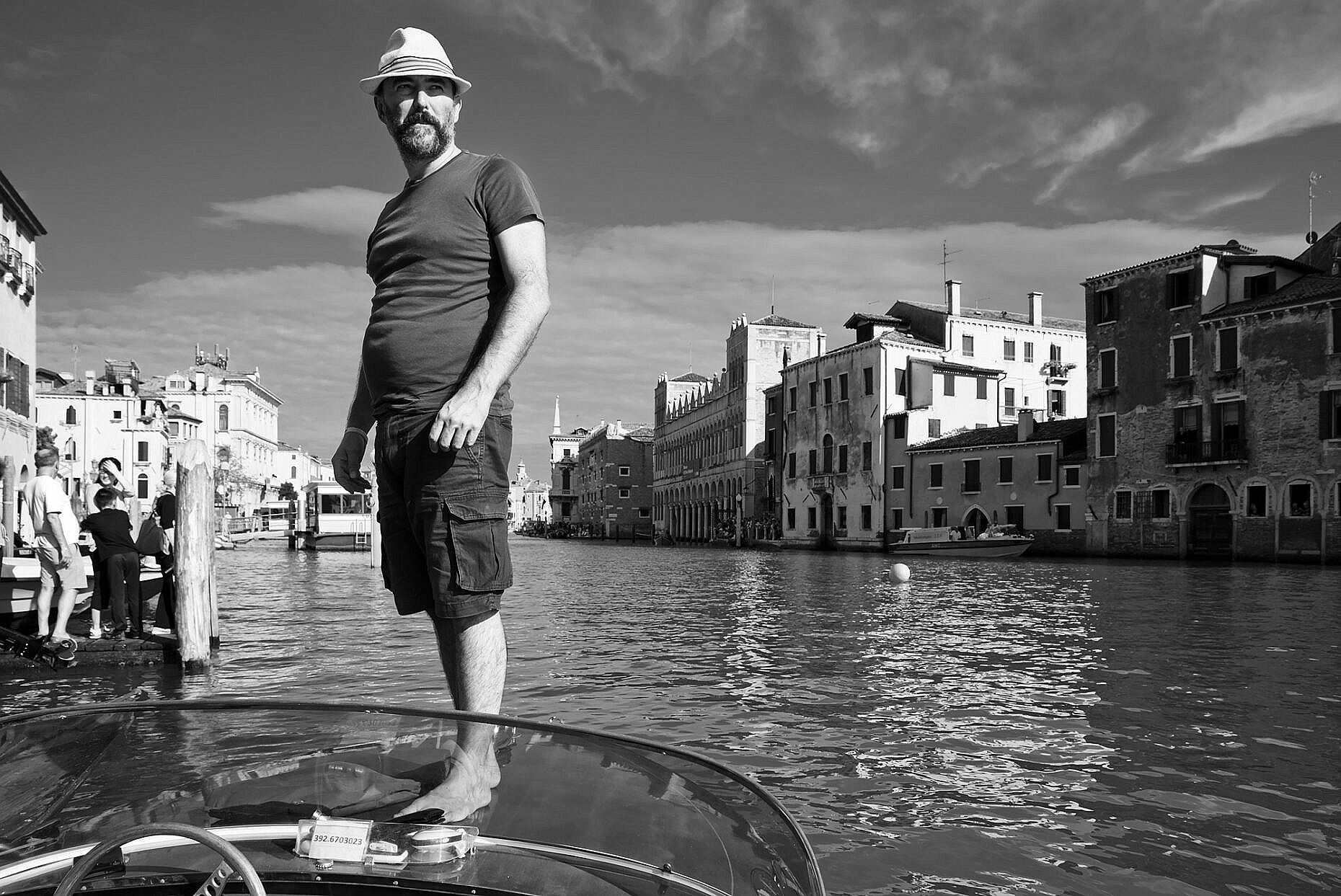Francesco Penzo on the lookout for the Regata Storica 2018, standing on the front of his motor boat on the Grand Canal